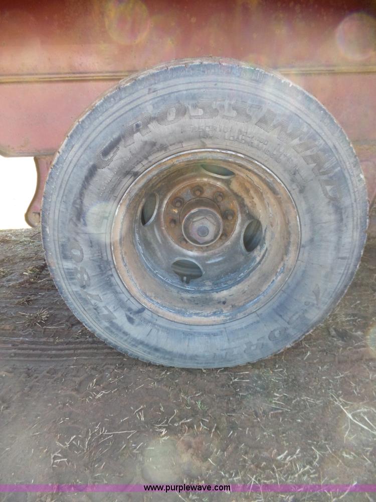 image for item K5779 2000 Big Tex 24-MF48 flatbed trailer