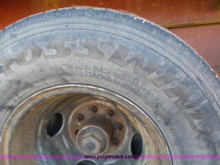 image for item K5779 2000 Big Tex 24-MF48 flatbed trailer