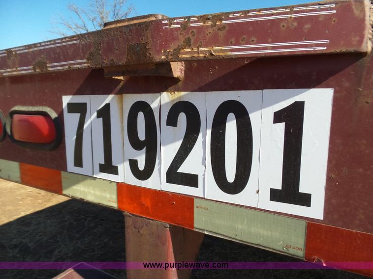 image for item K5779 2000 Big Tex 24-MF48 flatbed trailer