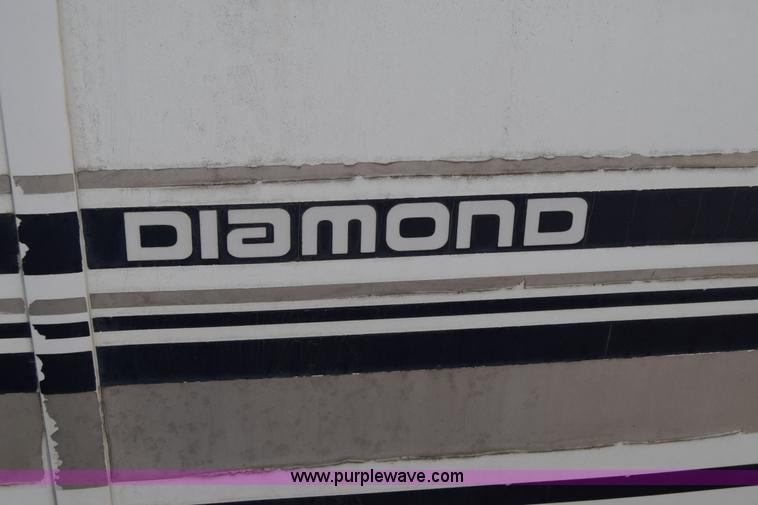 image for item K8713 2002 Ford 800 Diamond bus