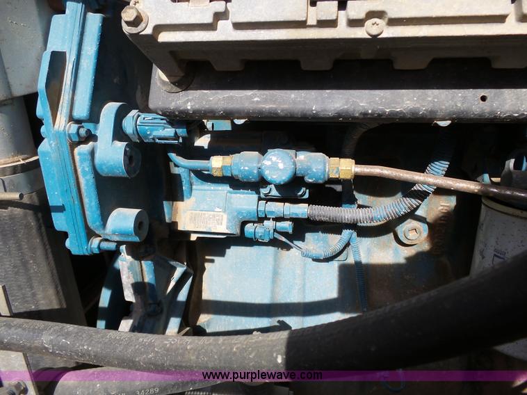 image for item L3667 2001 International 4700 propane fuel truck