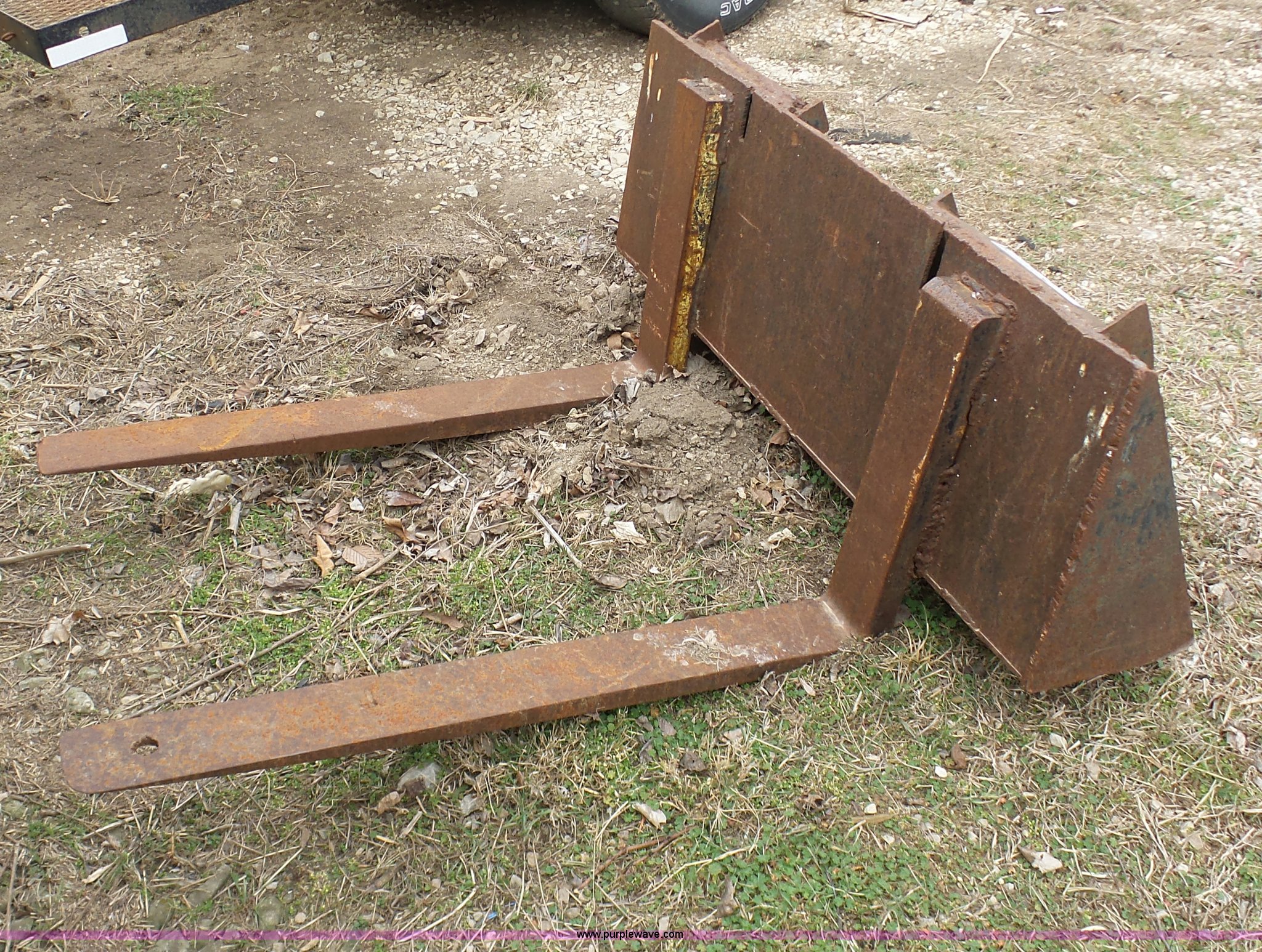 Skid steer forks in Freeman, MO Item BH9415 sold Purple Wave