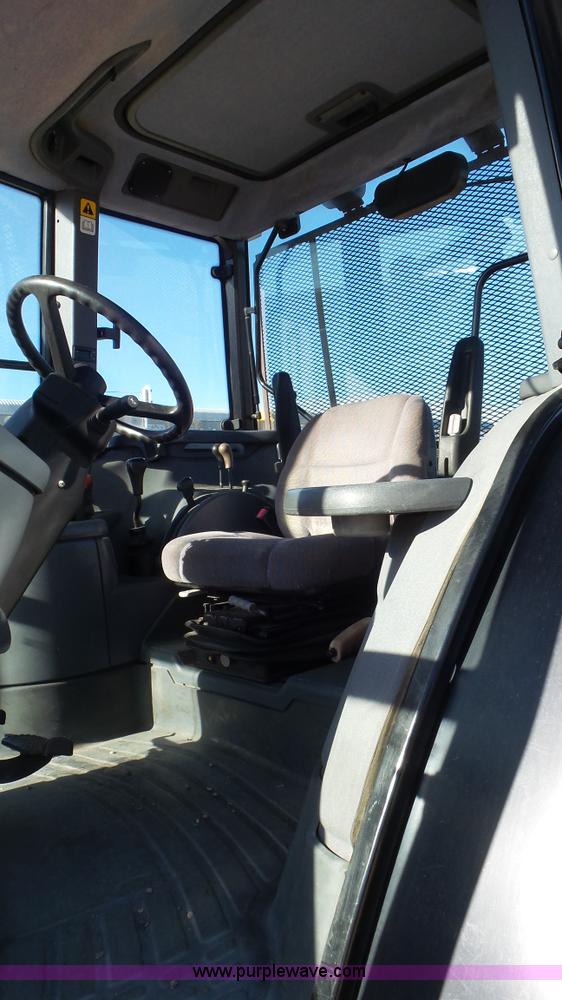 image for item J6211 2000 Ford TS100 tractor