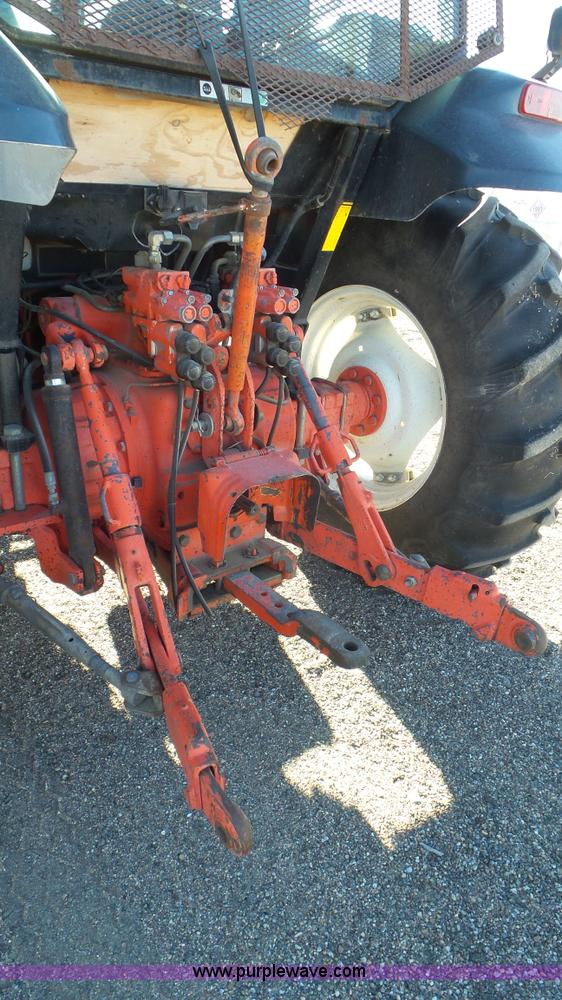 image for item J6211 2000 Ford TS100 tractor