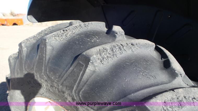 image for item J6211 2000 Ford TS100 tractor