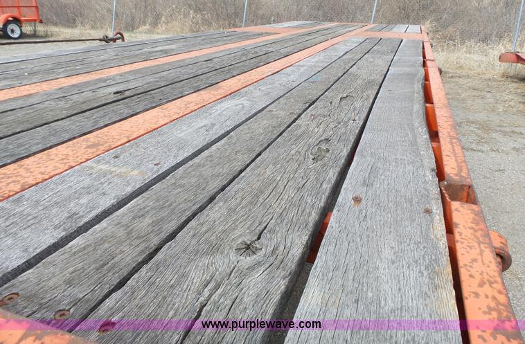 image for item J6276 2002 Evaco Superline D012T242T tilt deck trailer