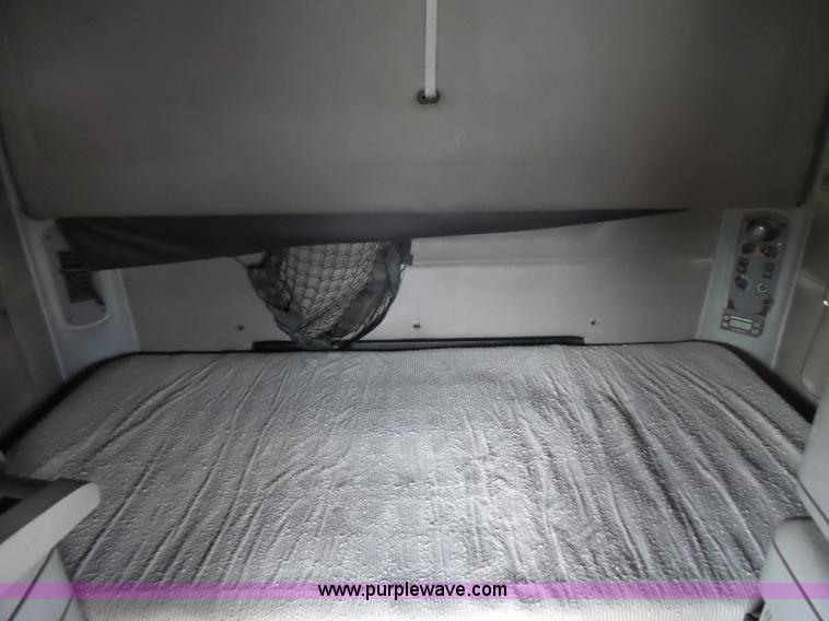 image for item L5422 2006 Freightliner Century Class ST120 semi truck