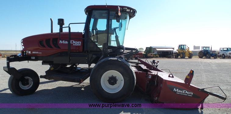 image for item BZ9069 2012 MacDon M205 self-propelled windrower
