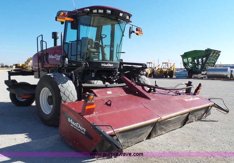 image for item BZ9069 2012 MacDon M205 self-propelled windrower