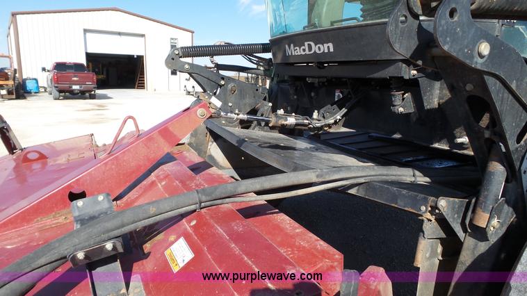image for item BZ9069 2012 MacDon M205 self-propelled windrower