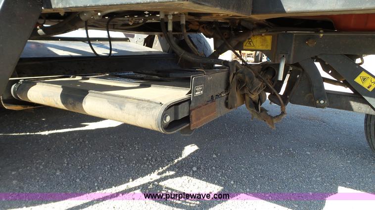 image for item BZ9069 2012 MacDon M205 self-propelled windrower