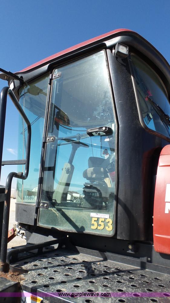 image for item BZ9069 2012 MacDon M205 self-propelled windrower