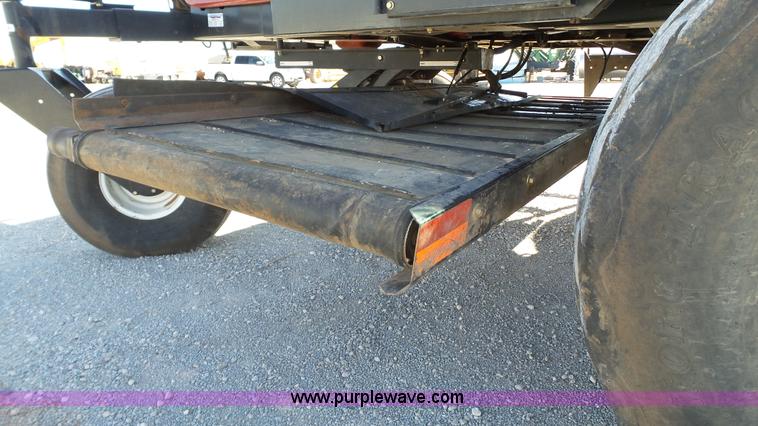 image for item BZ9069 2012 MacDon M205 self-propelled windrower