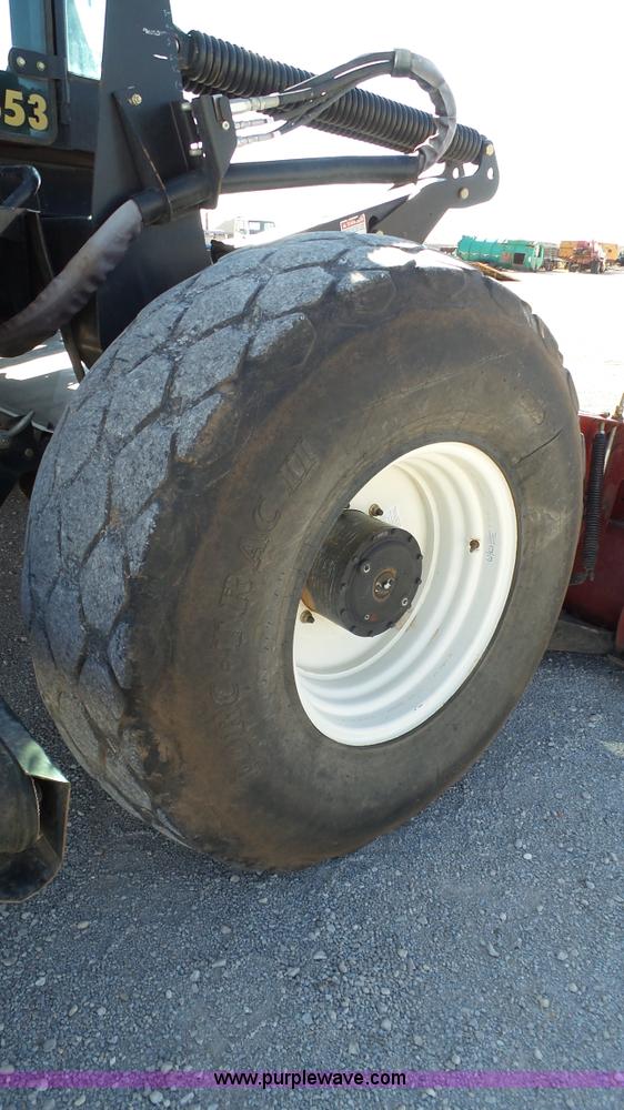 image for item BZ9069 2012 MacDon M205 self-propelled windrower