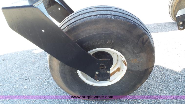 image for item BZ9069 2012 MacDon M205 self-propelled windrower