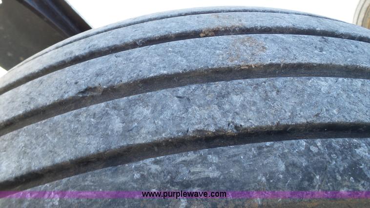 image for item BZ9069 2012 MacDon M205 self-propelled windrower