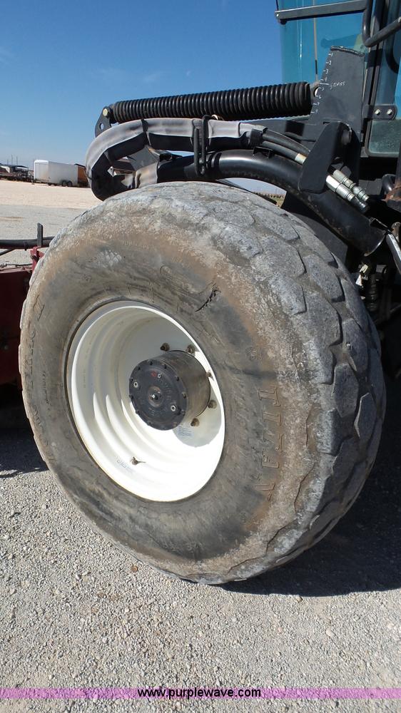 image for item BZ9069 2012 MacDon M205 self-propelled windrower