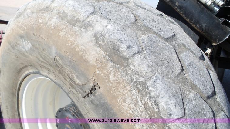 image for item BZ9069 2012 MacDon M205 self-propelled windrower