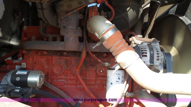 image for item BZ9069 2012 MacDon M205 self-propelled windrower