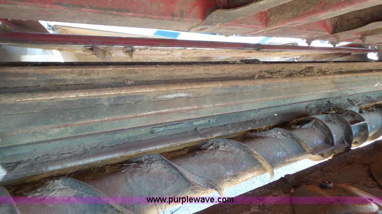 image for item BZ9069 2012 MacDon M205 self-propelled windrower