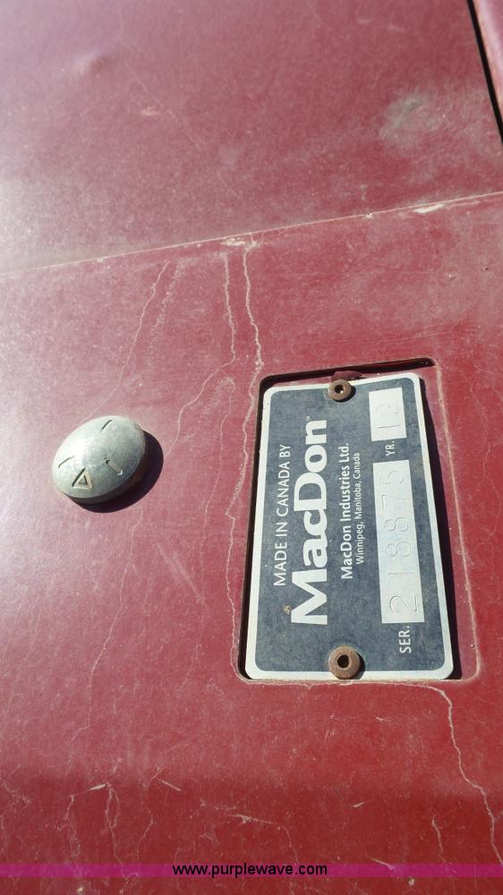 image for item BZ9069 2012 MacDon M205 self-propelled windrower