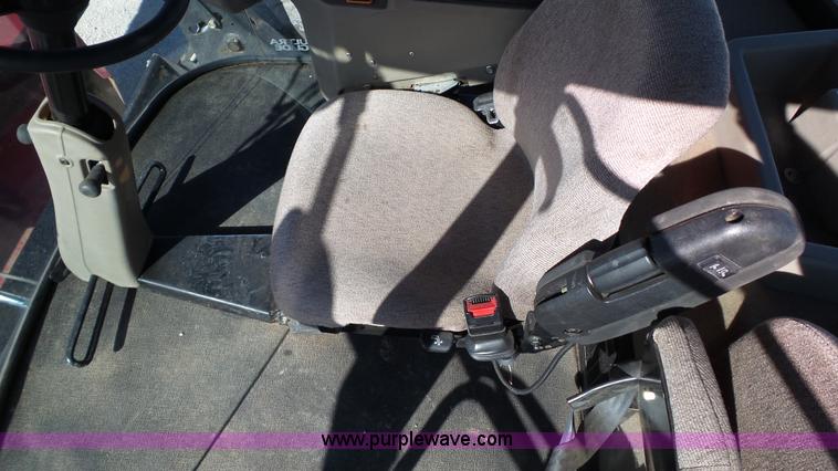 image for item BZ9069 2012 MacDon M205 self-propelled windrower