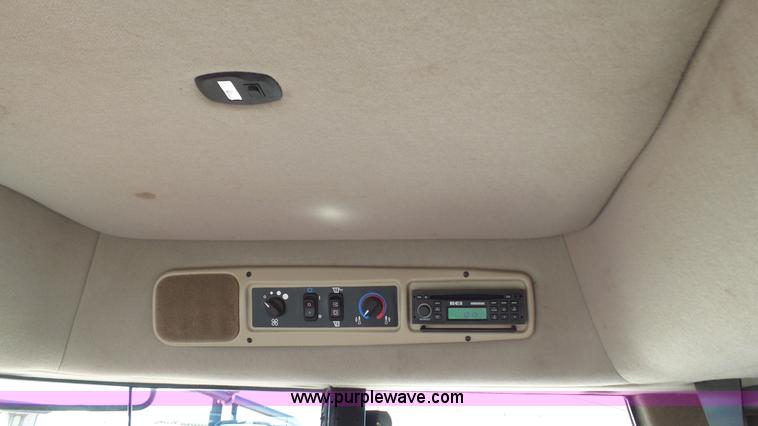 image for item BZ9069 2012 MacDon M205 self-propelled windrower