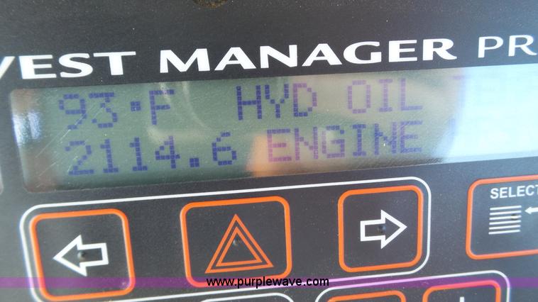 image for item BZ9069 2012 MacDon M205 self-propelled windrower