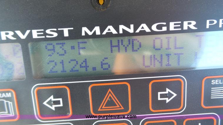 image for item BZ9069 2012 MacDon M205 self-propelled windrower