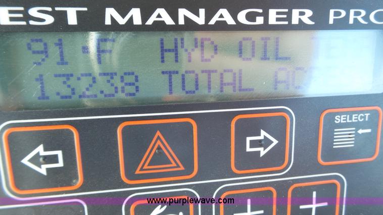 image for item BZ9069 2012 MacDon M205 self-propelled windrower