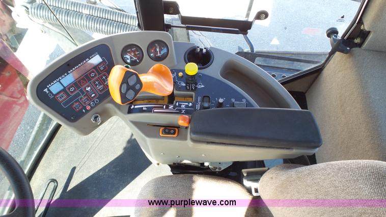 image for item BZ9069 2012 MacDon M205 self-propelled windrower