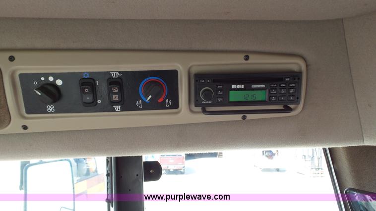 image for item BZ9069 2012 MacDon M205 self-propelled windrower