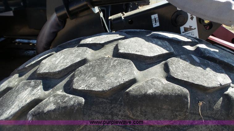 image for item BZ9070 2012 MacDon M205 self-propelled windrower