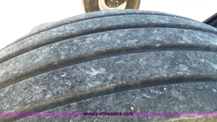 image for item BZ9070 2012 MacDon M205 self-propelled windrower