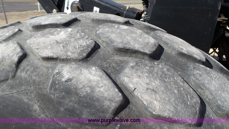 image for item BZ9070 2012 MacDon M205 self-propelled windrower