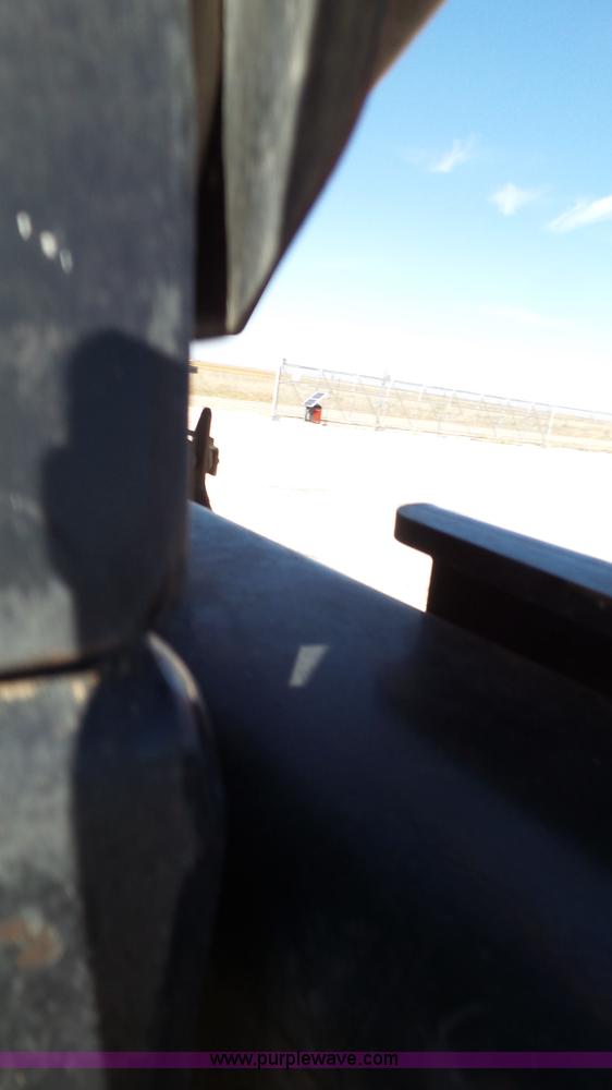 image for item BZ9070 2012 MacDon M205 self-propelled windrower