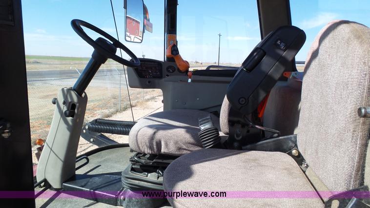 image for item BZ9070 2012 MacDon M205 self-propelled windrower