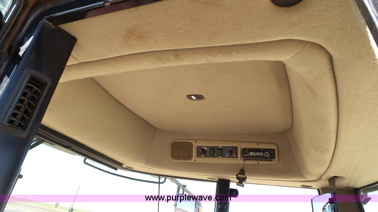 image for item BZ9070 2012 MacDon M205 self-propelled windrower