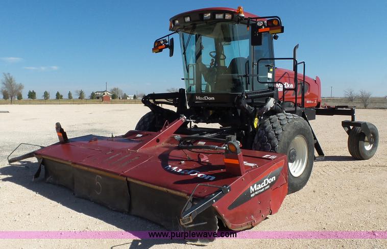 image for item BZ9071 2014 MacDon M205 self-propelled windrower