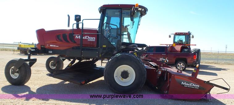 image for item BZ9071 2014 MacDon M205 self-propelled windrower