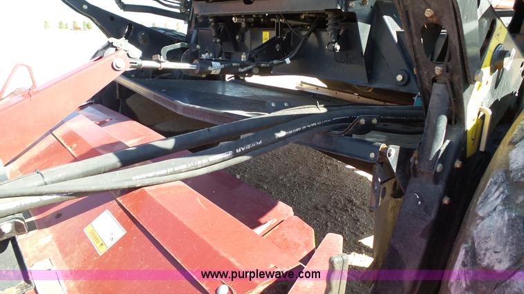 image for item BZ9071 2014 MacDon M205 self-propelled windrower