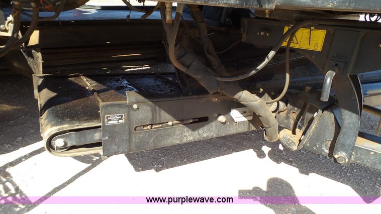 image for item BZ9071 2014 MacDon M205 self-propelled windrower