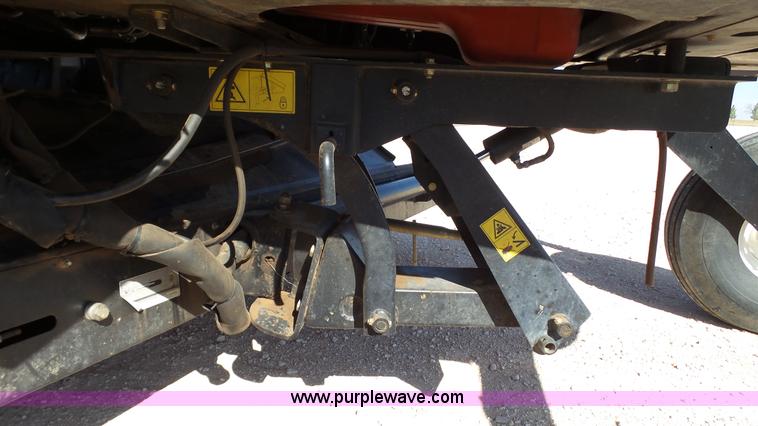 image for item BZ9071 2014 MacDon M205 self-propelled windrower