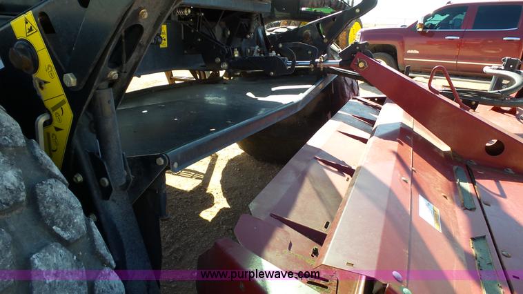 image for item BZ9071 2014 MacDon M205 self-propelled windrower