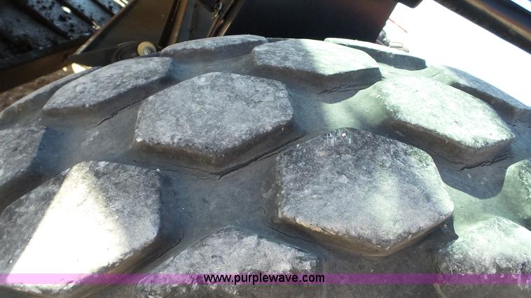 image for item BZ9071 2014 MacDon M205 self-propelled windrower