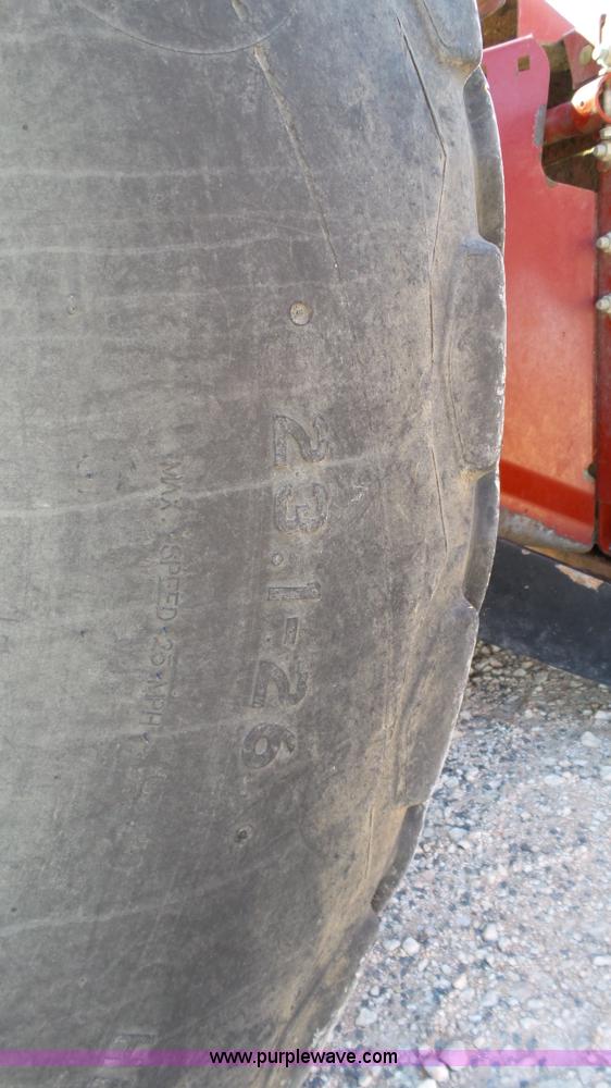 image for item BZ9071 2014 MacDon M205 self-propelled windrower