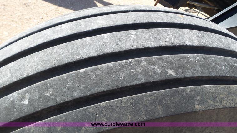 image for item BZ9071 2014 MacDon M205 self-propelled windrower