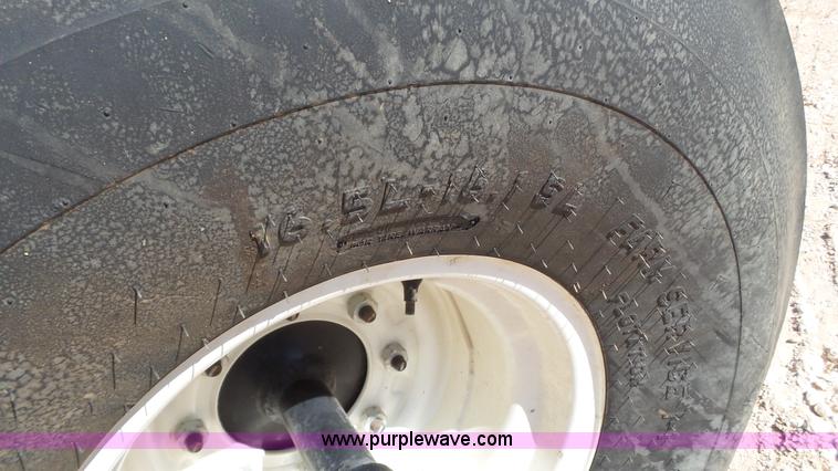 image for item BZ9071 2014 MacDon M205 self-propelled windrower