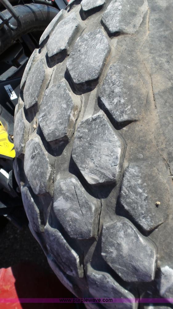 image for item BZ9071 2014 MacDon M205 self-propelled windrower