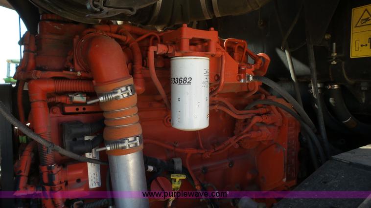 image for item BZ9071 2014 MacDon M205 self-propelled windrower